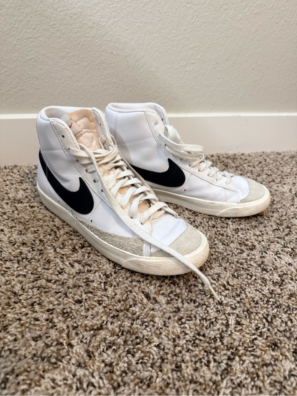 Nike Blazer White High-Top Sneakers with Black Swoosh
